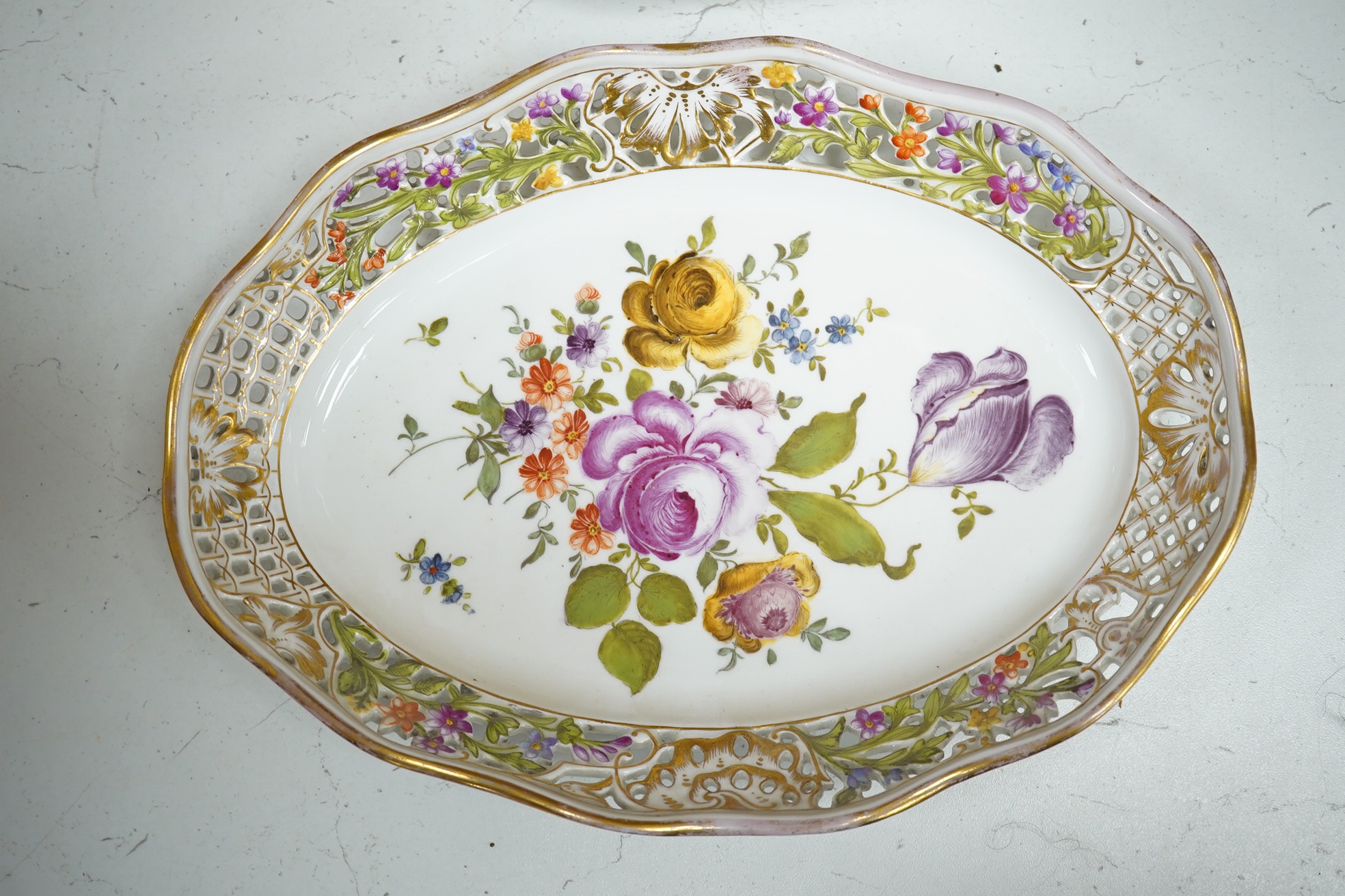 Three Potschappel flower painted reticulated dishes, largest 24.5 x 24.5cm. Condition - fair to good